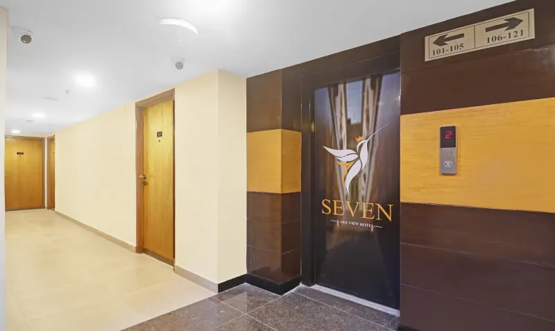 Lift lobby with gold Seven Lake View signage