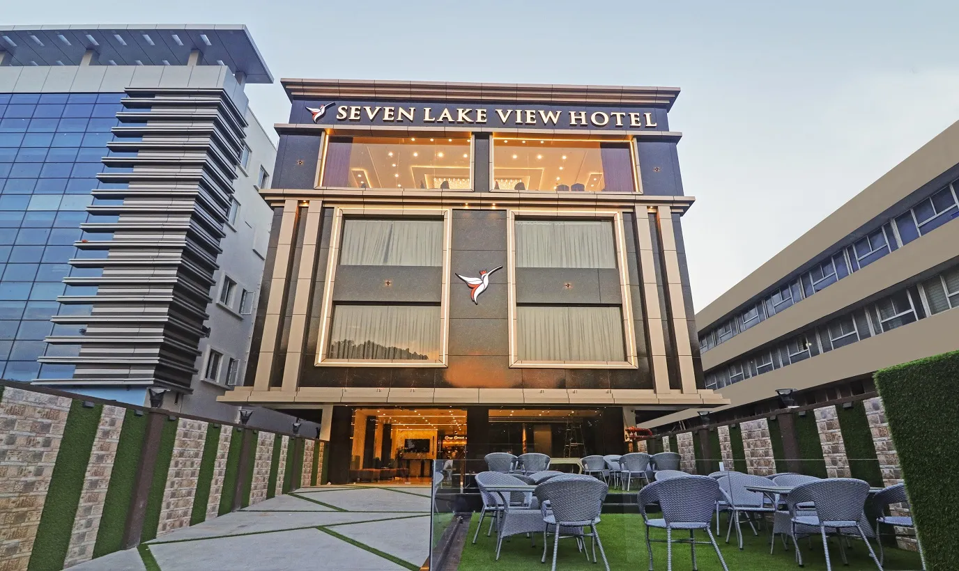Seven Lake View Hotel exterior at dusk