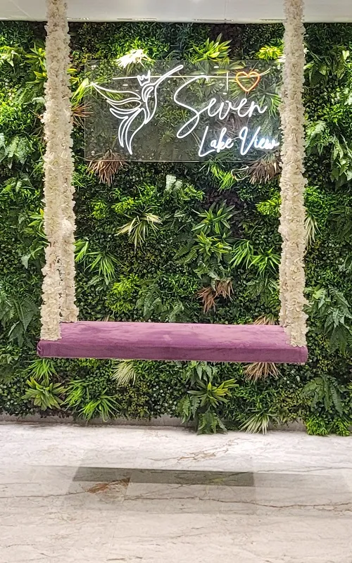 Lobby feature wall with the Seven Lake View mark